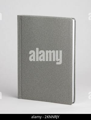 Gray silver office diary in standing view isolated on white background. Frontside Stock Photo