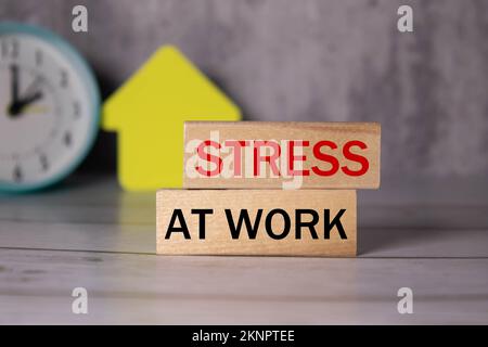 Stress management is shown on a business photo using the text Stock Photo