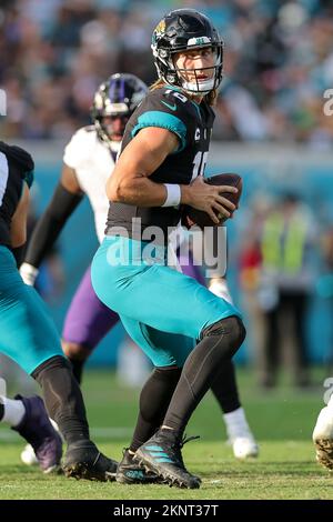 November 27, 2022: Jacksonville Jaguars quarterback Trevor Lawrence (16)  and Jacksonville Jaguars head coach Doug Pederson discuss a 2 point  conversion play during a game against the Baltimore Ravens in Jacksonville,  FL.