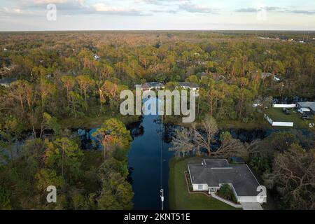 Surrounded by hurricane Ian rainfall flood waters homes in Florida residential area. Consequences of natural disaster Stock Photo