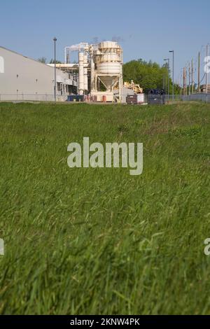 Industrial waste management and recuperating apparatus at manufacturing facility. Stock Photo