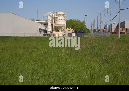 Industrial waste management and recuperating apparatus at manufacturing facility. Stock Photo