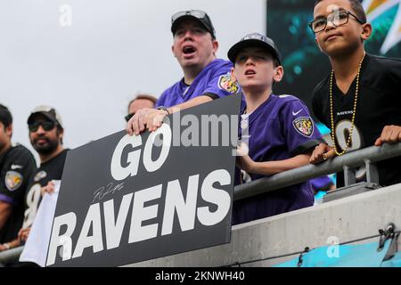 Baltimore Ravens vs. Jacksonville Jaguars. Fans support on NFL Game.  Silhouette of supporters, big screen with two rivals in background Stock  Photo - Alamy