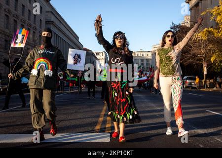 Washington, United States. 26th Nov, 2022. People participate in a march to support protesters in Iran. Demonstrations erupted following the September 16, 2022, death of 22-year-old Mahsa Amini and are now in their 3rd month. Protesters are demanding a secular, democratic Iran and are the most serious threat to the Islamic regime to date. Credit: SOPA Images Limited/Alamy Live News Stock Photo