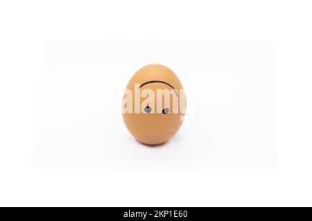 One confused egg on White background Stock Photo