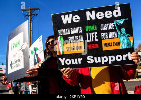 Reno, United States. 27th Nov, 2022. Women chant slogans during the ...