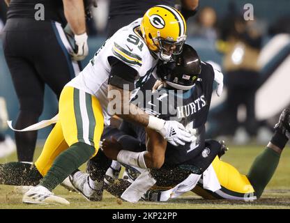Philadelphia, United States. 27th Nov, 2022. Philadelphia Eagles Jalen Hurts is sacked by Green Bay Packers Preston Smith in the first quarter in week 12 of the NFL season at Lincoln Financial Field in Philadelphia on Sunday, November 27, 2022 Photo by John Angelillo/UPI Credit: UPI/Alamy Live News Stock Photo