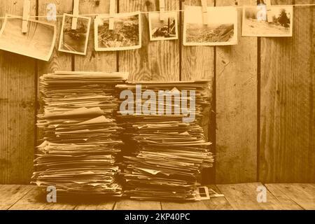 Albums from ages past piled up in a stacked scene of collectors nostalgia. Photographic memories Stock Photo