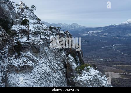 Bizarre mountain ranges of the Valley of Ghosts on Mount Demerdzhi in early spring. Crimea Stock Photo