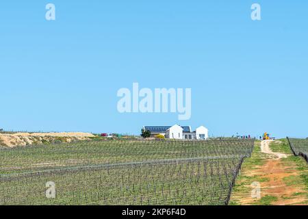 Hermanus, South Africa - Sep 20, 2022: Farm buildings and wineyards at Benguela Cove Wine Estate near Hermanus in the Western Cape Province Stock Photo