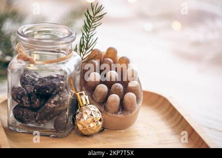 Winter spa composition with body care items and decor details. Stock Photo