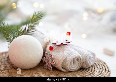 Winter spa composition with body care items and decor details. Stock Photo