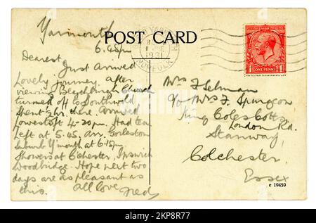 Reverse of original greetings card postcard  posted from Norfolk, U.K. This card has a postmarked 1d (one penny) Red King George V (postally used) stamp. posted / dated 1 June 1931. Stock Photo