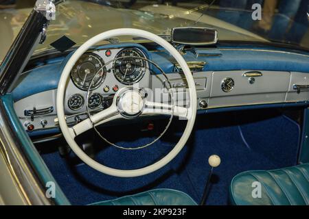 View of the interior of a historic sports car Classic Car Mercedes 190 SL cabriolet Roadster Steering wheel analogue round instruments, Techno Classic Stock Photo