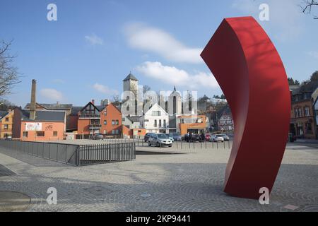 Hofgartenplatz with sculpture A Piece of History Nina Stoelting and Gábor Török 2015 and view of castle in Sonnenberg, tower, Wiesbaden, Taunus, Hesse Stock Photo