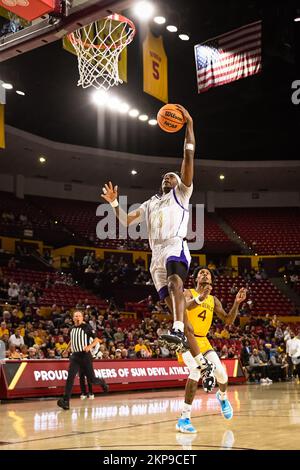 Alcorn State guard Dominic Brewton (23) dunks the ball in the first half of the NCAA basketball game against Arizona State in Tempe, Arizona, Sunday, Stock Photo