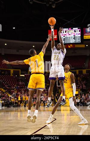 Alcorn State guard Dominic Brewton (23) attempts a shot in the first half of the NCAA basketball game against Arizona State in Tempe, Arizona, Sunday, Stock Photo