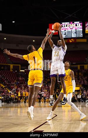 Alcorn State guard Dominic Brewton (23) attempts a shot in the first half of the NCAA basketball game against Arizona State in Tempe, Arizona, Sunday, Stock Photo