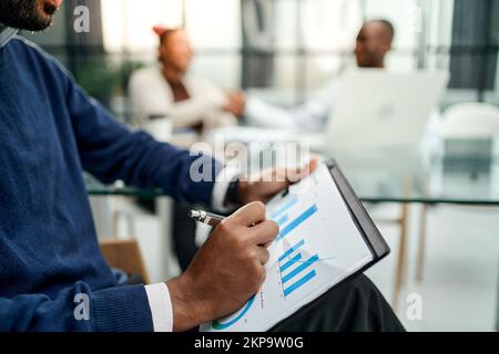business man analyzing a financial document . close-up. Stock Photo
