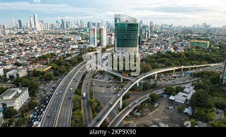 Aerial view of 'Taman Anggrek' the biggest shopping mall and apartment in Jakarta when sunrise. Jakarta, Indonesia, November 28, 2022 Stock Photo