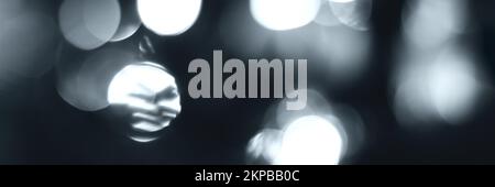 Blurred lights, gray, deep blue background, banner texture. Abstract bokeh with soft light header. Wide screen wallpaper. Panoramic web banner with co Stock Photo