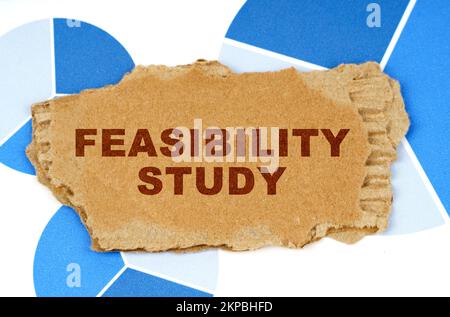 Top View of Business Shoes on the floor with the text -Feasibility Studies. Business and finance concept. Stock Photo