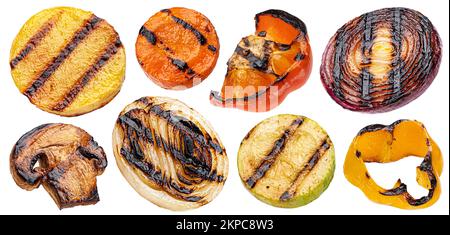 Falling grilled vegetable slices isolated on white background Stock Photo