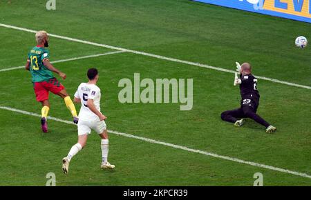 Cameroon's Eric Maxim Choupo-Moting scores their side's third goal of the game during the FIFA World Cup Group G match at the Al Janoub Stadium in Al Wakrah, Qatar. Picture date: Monday November 28, 2022. Stock Photo