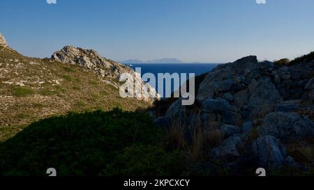 Southwestern tip of Turkey. Sunset from the ancient city of Datca Knidos. Yazikoy village harbor. Ancient Greek city of Knidos. The sky after sunset. Stock Photo