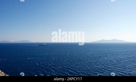 Southwestern tip of Turkey. Sunset from the ancient city of Datca Knidos. Yazikoy village harbor. Ancient Greek city of Knidos. The sky after sunset. Stock Photo