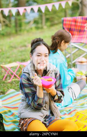 Japanese girls camping Stock Photo - Alamy