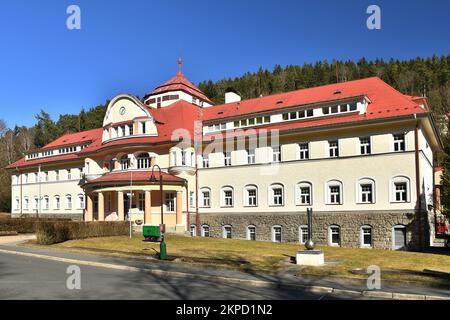 The Jachymov Spa using radon water for treatment was founded in 1906 as the first radon spa in the world. Pictured here is the Agricola Aquacentrum. Stock Photo