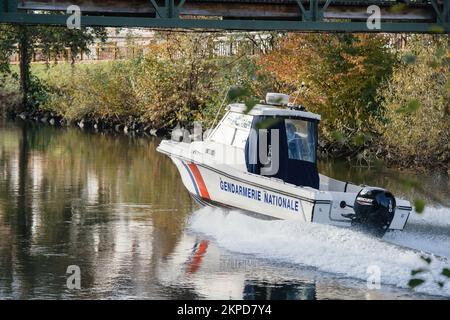 Strasbourg, France - Nov 22, 2022: Rear view of Gendarmerie Nationale speed turboboat on the Ill river - going fast to a crime scene Stock Photo