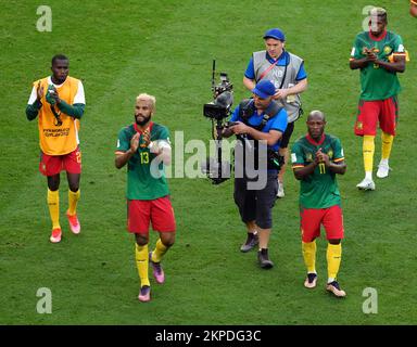 Cameroon captain Eric Maxim Choupo-Moting and team-mates applaud the fans after the FIFA World Cup Group G match at the Al Janoub Stadium in Al Wakrah, Qatar. Picture date: Monday November 28, 2022. Stock Photo