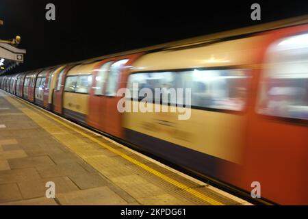 A London Underground train leaving Brent Cross station, North London travelling northwards towards it's terminus at Edgware, 4 stops away Stock Photo