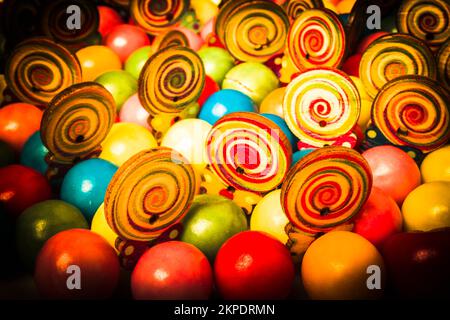 Colorful still life artwork on a swirl of corner store candies in vivid retro varieties