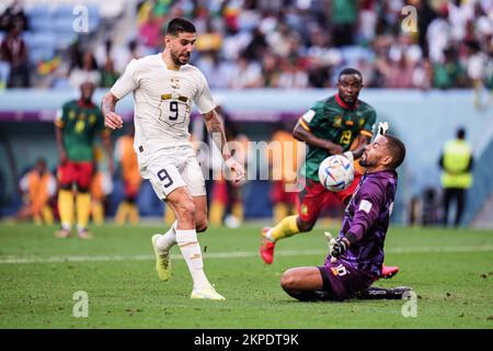 Al Wakrah, Qatar. 28th Nov, 2022. Aleksandar Mitrovic (L) of Serbia shoots during the Group G match between Serbia and Cameroon at the 2022 FIFA World Cup at Al Janoub Stadium in Al Wakrah, Qatar, Nov. 28, 2022. Credit: Meng Dingbo/Xinhua/Alamy Live News Stock Photo