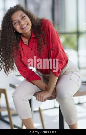 Portrait of a young business woman in an office Stock Photo