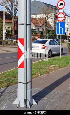 a traffic signs on a metal pole in the street Stock Photo - Alamy