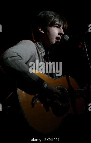 THE SLOW CLUB, EARLY GIG, 2007: Singer and guitarist Charles Watson from the Sheffield alternative pop duo The Slow Club at Clwb Ifor Bach in Cardiff, Wales, UK during the Swn Festival on November 1, 2007. Photograph: ROB WATKINS Stock Photo