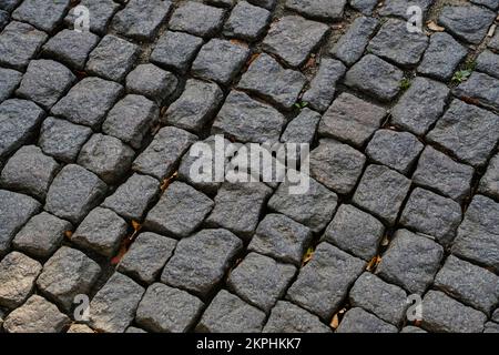 Old stone paving stones, road surface Stock Photo