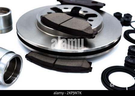 Automotive Spare Parts of disc brake pads system, disc brake caliper piston, disk brake repair kit isolated on white background, Car maintenance servi Stock Photo