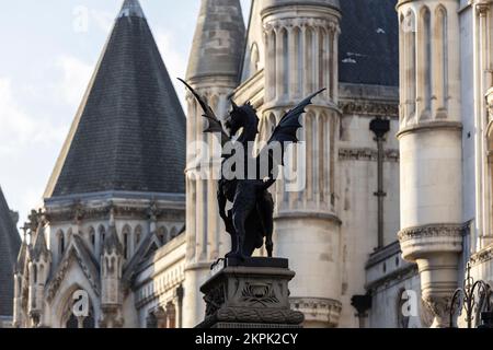 The 'Griffin' dragon statue on a pedestal marks the principal ceremonial entrance to the City of London where The Strand meets Fleet Street, England Stock Photo