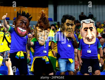 Doha, Qatar. 28th Nov, 2022. Fans cheer prior to the Group G match between Brazil and Switzerland at the 2022 FIFA World Cup at Ras Abu Aboud (974) Stadium in Doha, Qatar, Nov. 28, 2022. Credit: Wang Lili/Xinhua/Alamy Live News Stock Photo
