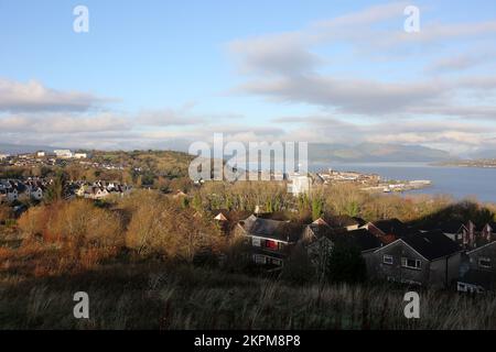 Gourock, Inverclyde, Scotland, UK. View from  High School called Clydeview across the town of Gourock. In the distance can be seen Kilcreggan. The stretch of water in front is the entrance to the River Clyde and is the route submarines take to reach Faslane on the Gare Loch. West bay is to the left and Gourock Bay on the right. On the horizon to the left is Tower Hill Park with the new St Columbas High School Stock Photo