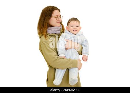 Mother woman with toddler baby boy in her arms, isolated on a white background. Mom with a child son. One year old kid Stock Photo