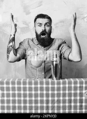 Brutal caucasian hipster doing tropical alcohol fresh cocktai Stock Photo