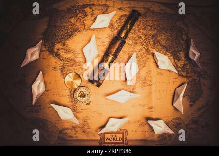 Travel and exploration still life photo on a nautical sailing boats and vintage navigation equipment. Maritime book cover concept Stock Photo