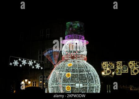 Urban christmas decoration with giant snowman made with led lights in Vigo, Spain Stock Photo