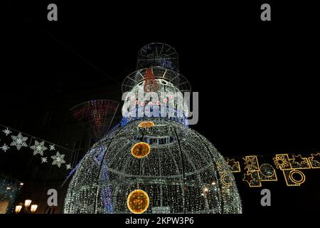 Urban christmas decoration with giant snowman made with led lights in Vigo, Spain Stock Photo